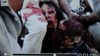 Captured Gaddafi covered in blood - FIRST PHOTO