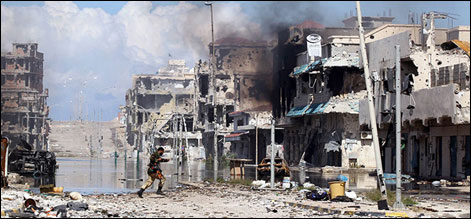 سرت میں عبوری کونسل کی حامی فورسز کی پسپائی