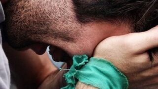 Man weeping