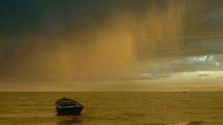 sea boat in the rain