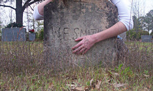 draped over grave