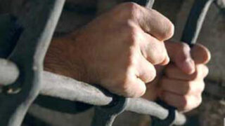 prisoner in jail