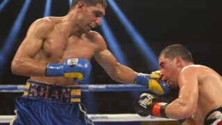 Khan Beats Molina