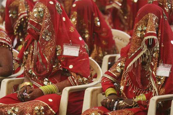 عوامی تحریک کے دھرنے میں تین جوڑوں کی شادیاں