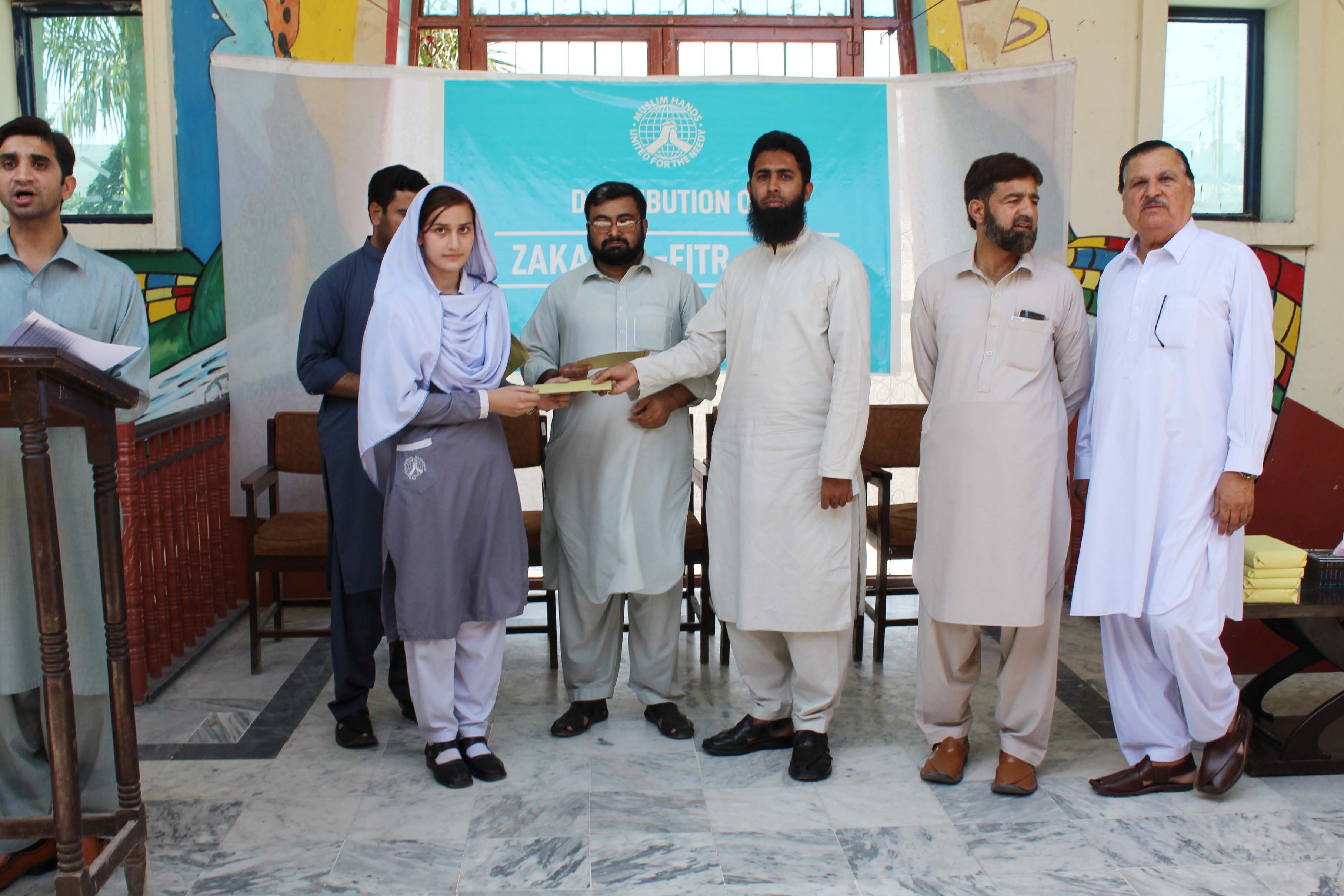 یتیم بچوں میں فطرانہ تقسیم کرنے کی یادگار تقریب