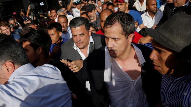 وینزویلا: گوآئیڈو کی وطن واپسی، حامیوں اور مخالفین کا ردعمل