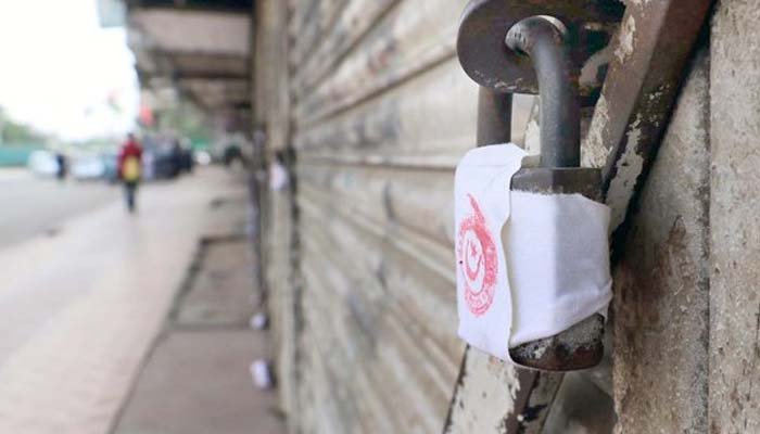 لاہور: کورونا ایس او پیز کی خلاف ورزی پر بینک کی برانچ اور دکانیں سیل