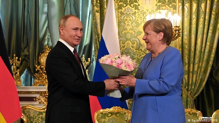 Angela Merkel and Vladimir Putin